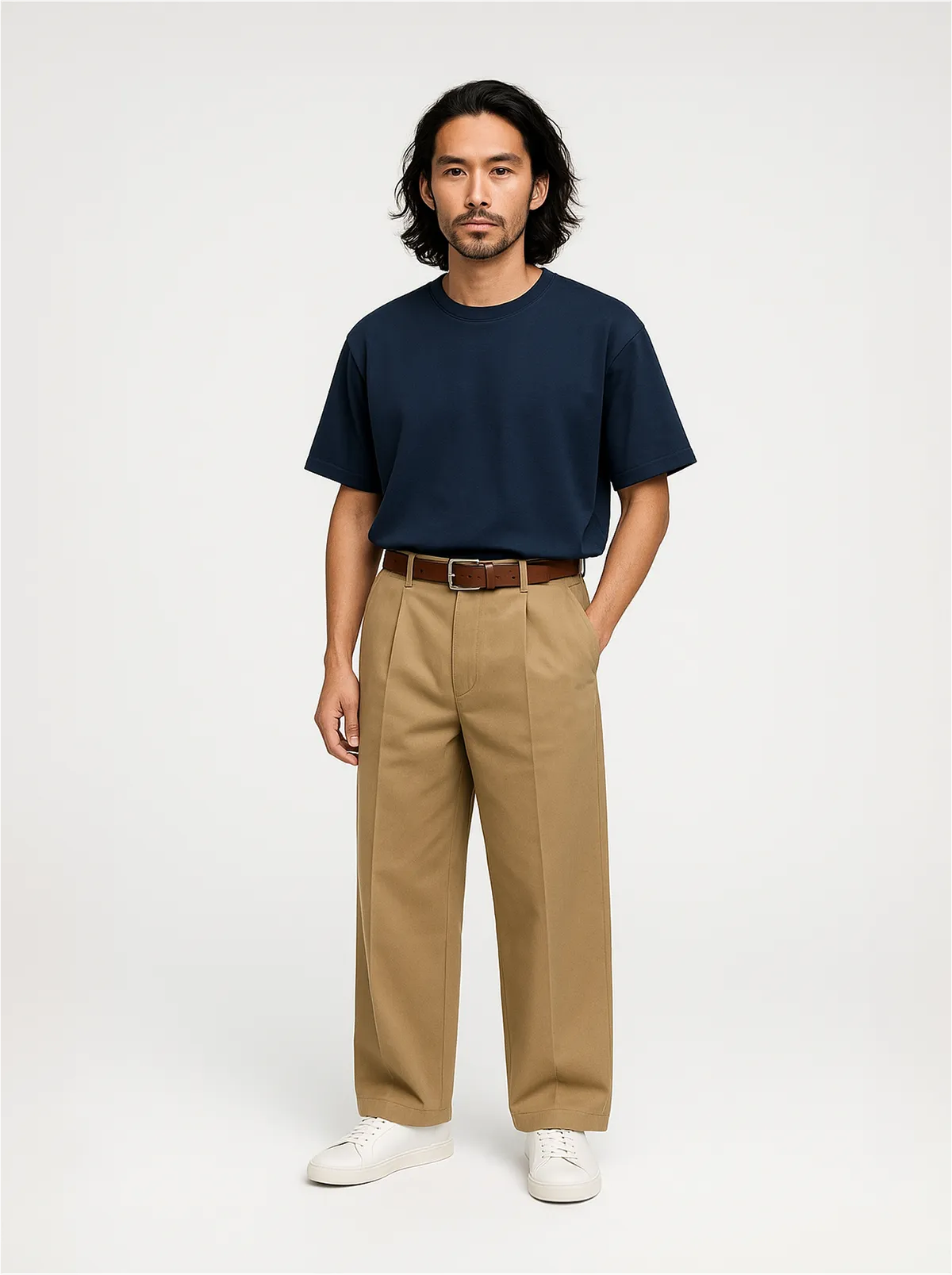 ChatGPT-generated on-model image of a navy tee and khaki chino, where the trouser front has been redrawn with a pleat the original garment does not have
